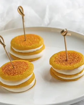 Chebab pancakes stacked and skewered